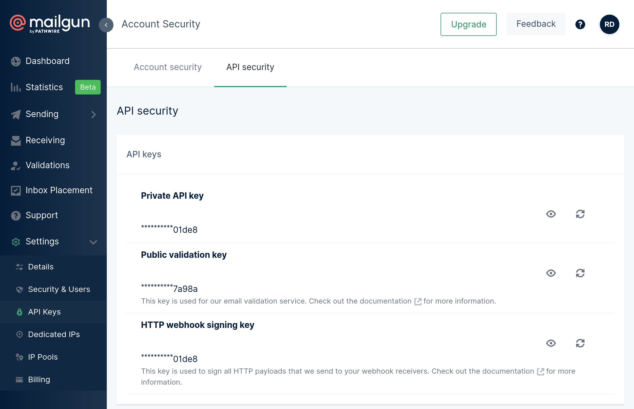 Showing the Mailgun API security screen. The page has a white background with a dark blue left sidebar that contains navigation. The page displays the private API key, the public validation key, and the HTTP web hook signing key.